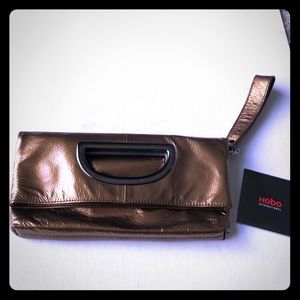 Hobo bronze patent clutch purse